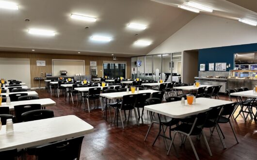 Function Centre dining hall set with tables and chairs for a group